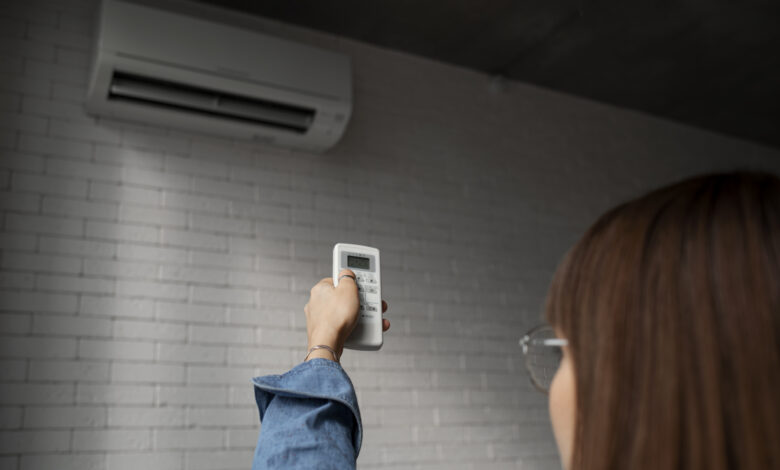 young woman using home technology